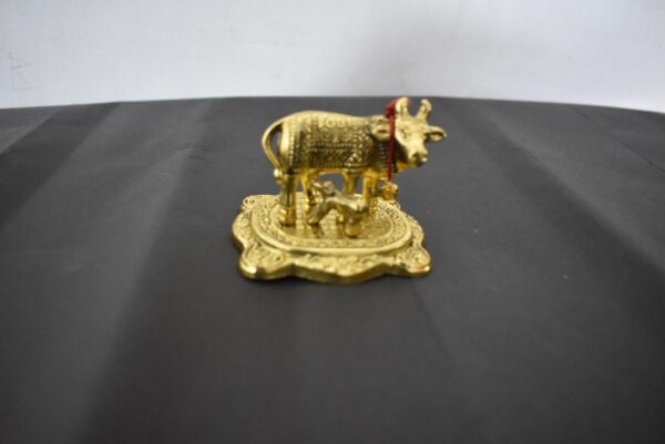Cow and Calf in fancy metal.